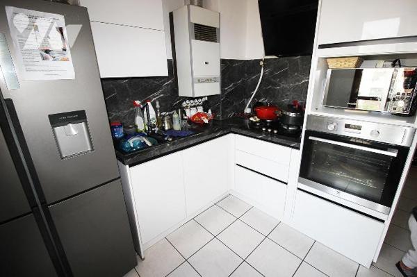 Appartement T4 de 80m2 (Carrez) avec son balcon de 10m2 au sein d'une copropriété agréable (13e)