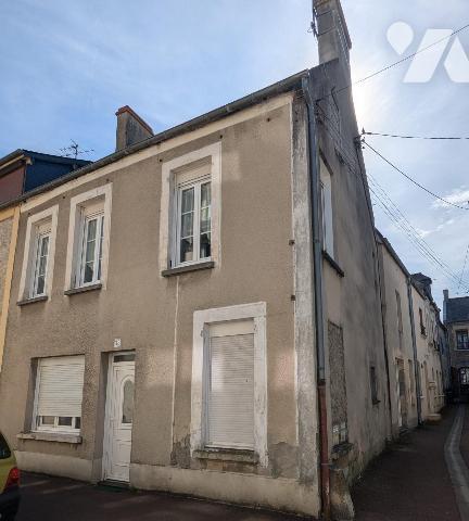 Immeuble comprenant deux appartements dont un loué