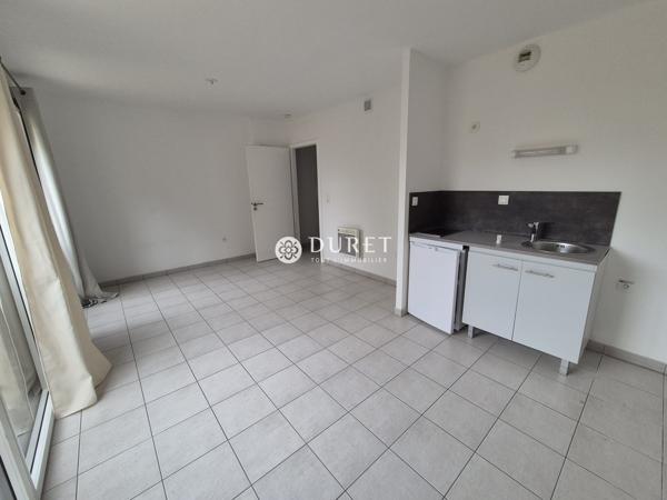 APPARTEMENT 1 PIECE ET STATIONNEMENT EN SOUS-SOL