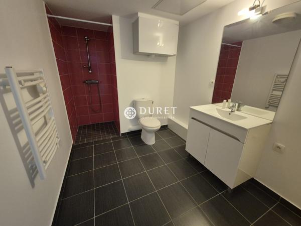 APPARTEMENT 1 PIECE ET STATIONNEMENT EN SOUS-SOL