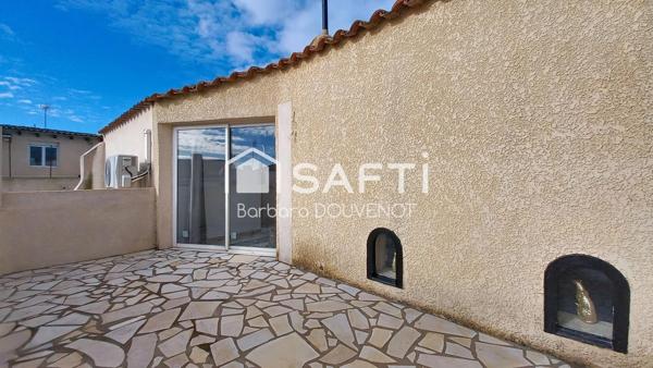 Maison de village de 125 m² - 3 terrasses - grand garage.