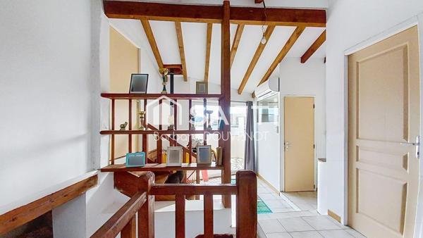 Maison de village de 125 m² - 3 terrasses - grand garage.