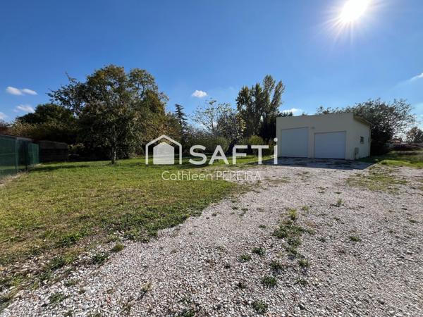 Bâti de 52 m² avec terrain constructible