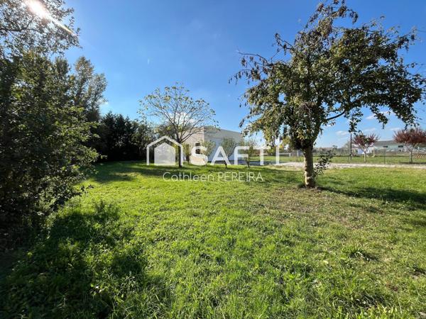 Bâti de 52 m² avec terrain constructible