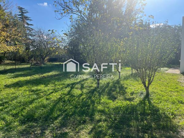 Bâti de 52 m² avec terrain constructible
