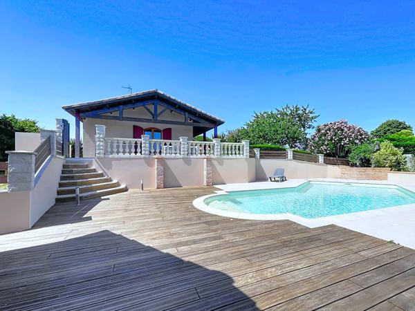Maison T4 plain-pied avec piscine et sous-sol - Bruguières 31150