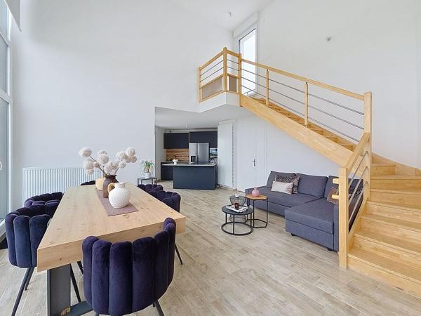 Duplex dernier étage 117 m² - Rooftop 40 m² - 5 ch - DPE A - CHESSY
