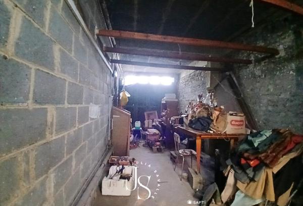 maison à fort potentiel avec grand garage et jardin