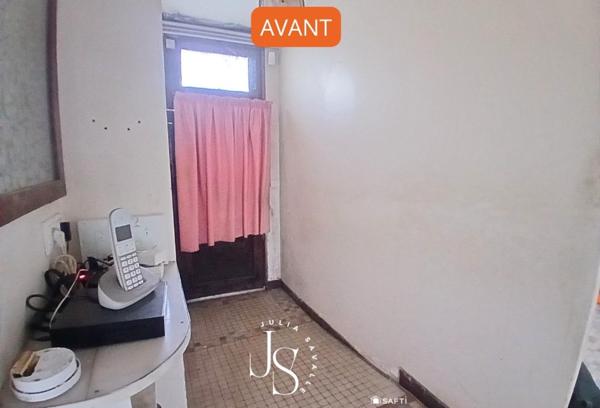 maison à fort potentiel avec grand garage et jardin