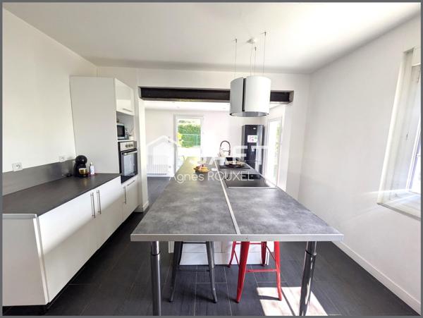 Près des commerces - double garage - vie de plain-pied