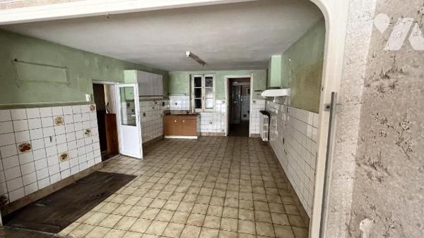 Maison d'habitation mitoyenne à rénover