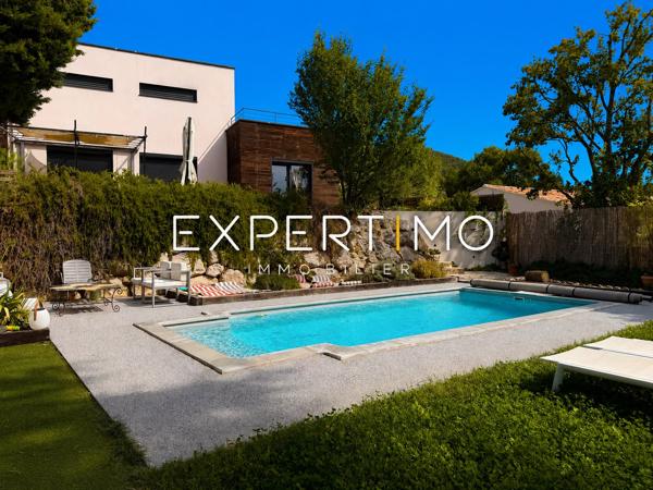 Maison contemporaine de 134 m2 avec piscine et studio indépendant.
