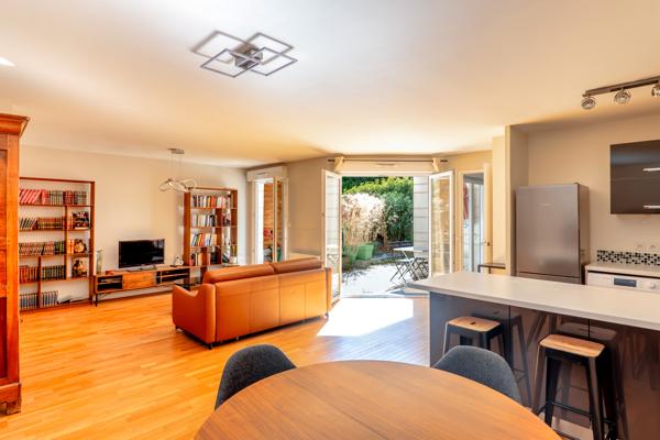 T4 de 78 m² avec jardin de 36 m² – Centre-ville – 2 chambres – 46 m² de pièce de vie – Parking