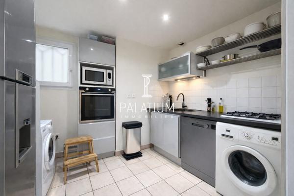 Appartement deux pièces avec balcon, ascenseur et place parking sécurisée