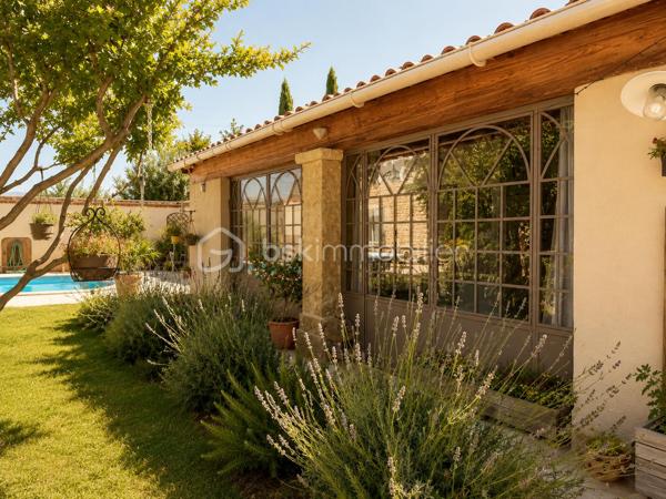🌿✨ Maison en pierre avec vue Ventoux et Dentelles de Montmirail ✨🌿

À proximité du village, tout en profitant d’un environnement calme et privilégié, découvrez cette magnifique maison en pierre entièrement rénovée, offrant environ 180 m² habitables au cœur d’un superbe jardin arboré au charme authentique.

Dès l’entrée, le charme opère avec de beaux volumes et une atmosphère chaleureuse. La maison propose un vaste espace de vie composé d’un salon, d’une salle à manger et d’une cuisine équipée, ouverts sur une très belle terrasse ombragée, idéale pour profiter des repas d’été dans un cadre paisible.

À l’étage, l’espace nuit se compose de quatre chambres dont une parentale , d’une salle de bain avec baignoire et douche, d’un grand dressing ainsi qu’un toilette indépendant.
Le jardin, véritable écrin de verdure, accueille une grande piscine parfaitement intégrée dans l’environnement, invitant à la détente et à la douceur de vivre provençale.

La dépendance, pleine de charme, offre un espace indépendant idéal pour recevoir famille et amis ou envisager une activité complémentaire.
Elle se compose d’un agréable coin nuit, d’une petite cuisine fonctionnelle, d’un espace salle d’eau avec toilettes, le tout sublimé par de magnifiques fenêtres esprit verrière en fer forgé apportant beaucoup de cachet et une belle luminosité.

Les prestations complètent parfaitement ce bien rare :
 Piscine
 Terrasse ombragée
 Deux garages
 Un bureau
 Une buanderie
 Cheminée, poêle à granules, climatisation. 

🌿 Un véritable havre de paix alliant authenticité, confort et douceur de vivre, idéal pour les amoureux de la Provence et des belles demeures de caractère.
                            Coup de cœur assuré – À découvrir sans tarder.
