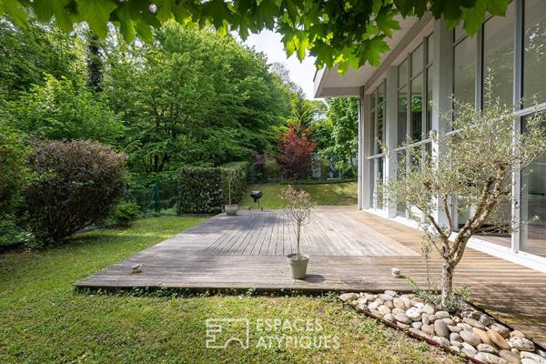 Duplex atypique et sa verrière sur la forêt