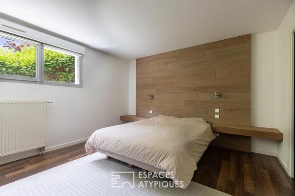 Duplex atypique et sa verrière sur la forêt