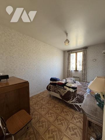 Maison de plain pied 3 chambres, une salle à manger séjour, une salle d'eau, un garage