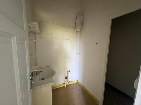 Maison en plein centre de ville avec terrain constructible