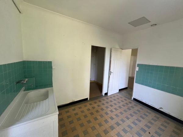 Maison en plein centre de ville avec terrain constructible