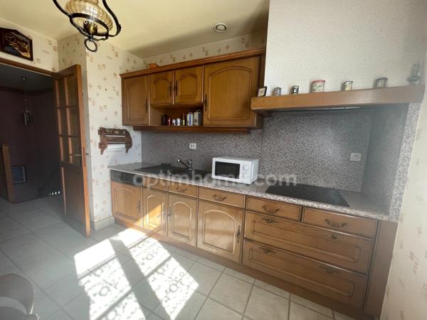Maison avec garage et atelier sur 1900m2 de terrain