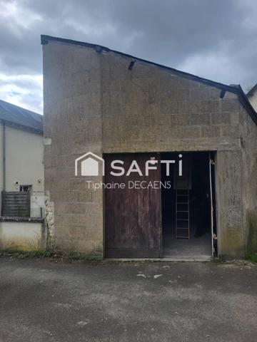 garage avec mezzanine, pouvant devenir un logement