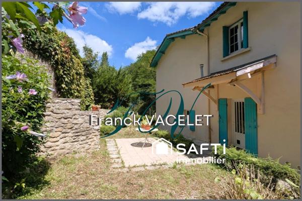 Charmante maison en pierre avec jardin, garage et fort potentiel