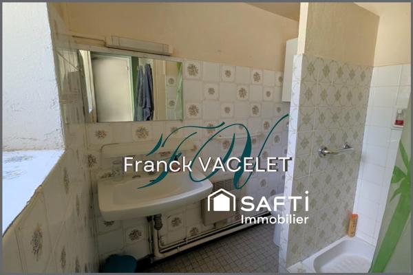 Charmante maison en pierre avec jardin, garage et fort potentiel