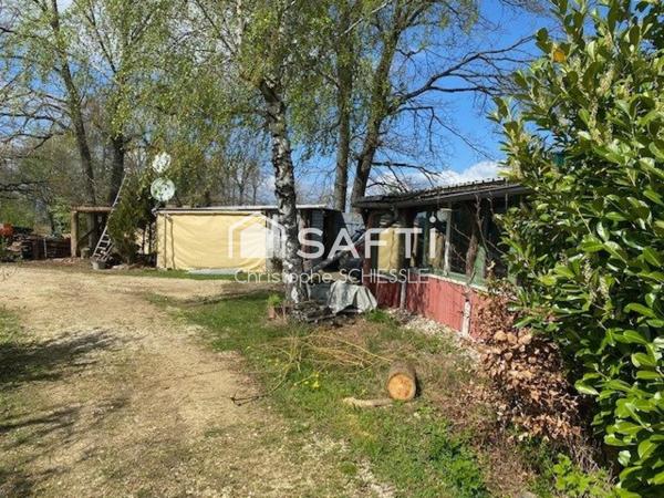 Etang avec grand cabanon sur 3 hectares