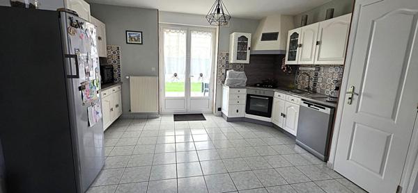 Maison familiale de 116 m²  habitable, offrant 4 chambres et un grand jardin