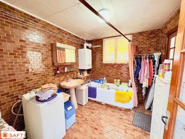 Maison mitoyenne avec double jardin – Valenciennes- Beau Potentiel