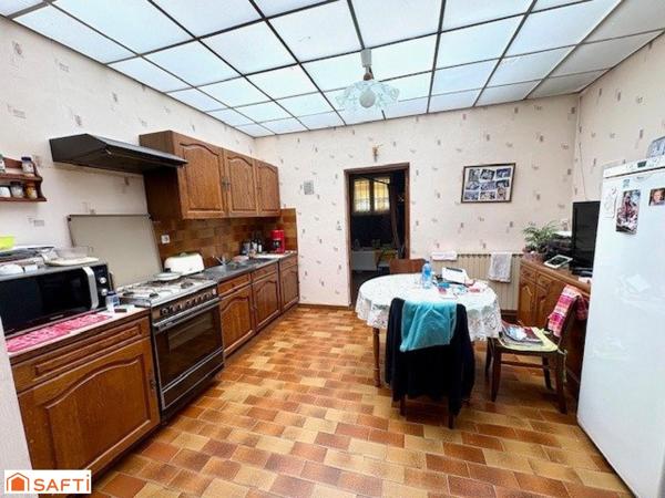 Maison mitoyenne avec double jardin – Valenciennes- Beau Potentiel