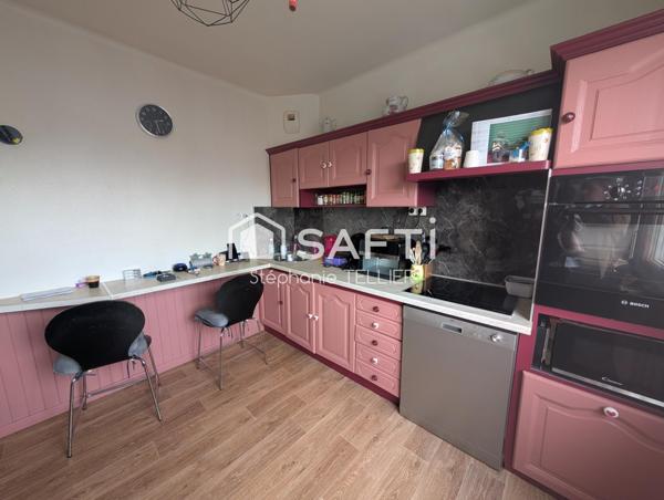 Habitation de 100 m2 + local commerce  160 m2