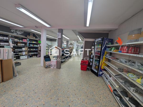 Habitation de 100 m2 + local commerce  160 m2