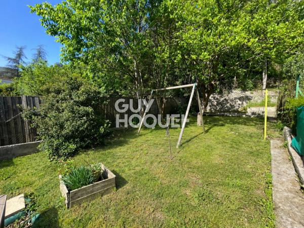 Maison avec jardin et garage