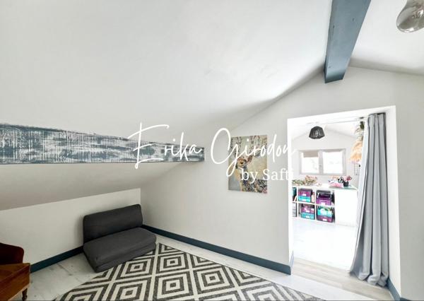 Appartement en Duplex - 2 places de stationnement - 1 cave