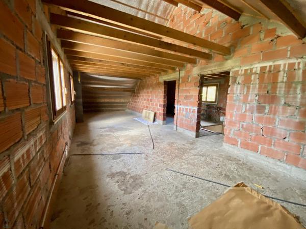 Maison avec potentiel de 180 m2 habitables