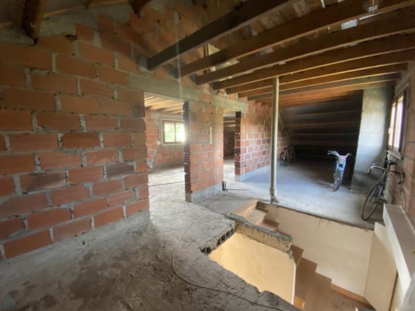 Maison avec potentiel de 180 m2 habitables