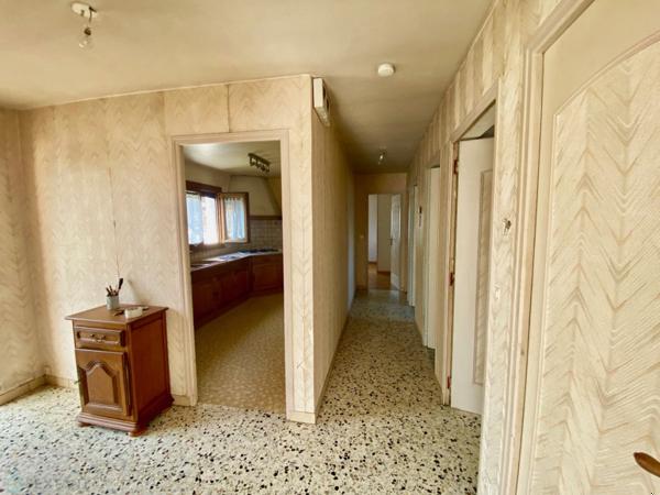 Maison avec potentiel de 180 m2 habitables