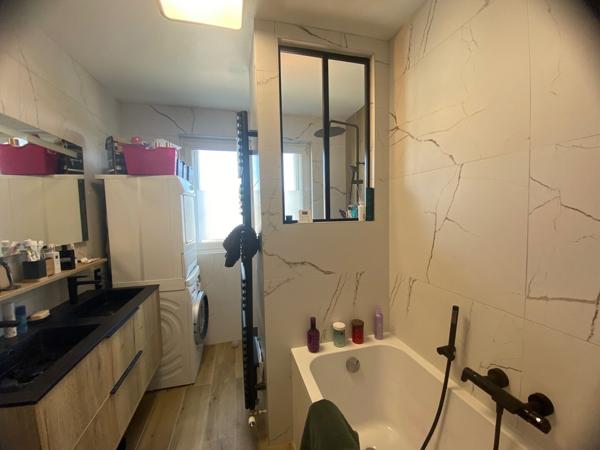 Essey Appartement rénové de 88m2 avec balcon, garage et caves. 159K€