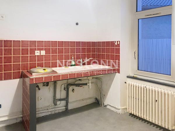 Immeuble avec local commercial et un duplex dans centre ville Yssingeaux avec terrasse et garage