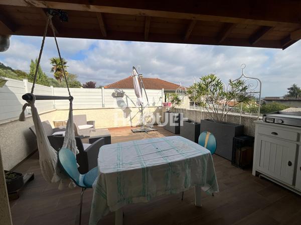 Maison récente de 91 m² avec terrasse et stationnements