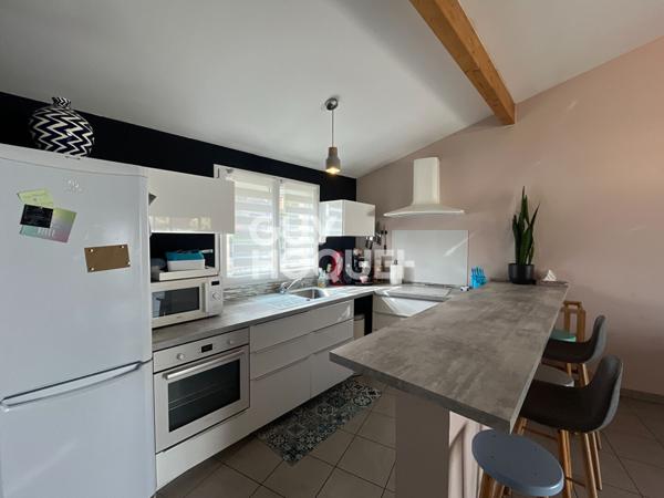 Maison récente de 91 m² avec terrasse et stationnements