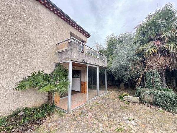 Maison 133 m² avec jardin et fort potentiel.