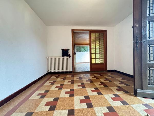 Maison 133 m² avec jardin et fort potentiel.