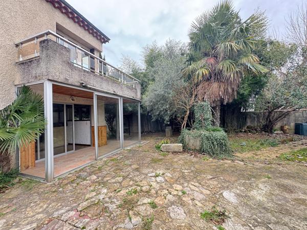 Maison 133 m² avec jardin et fort potentiel.