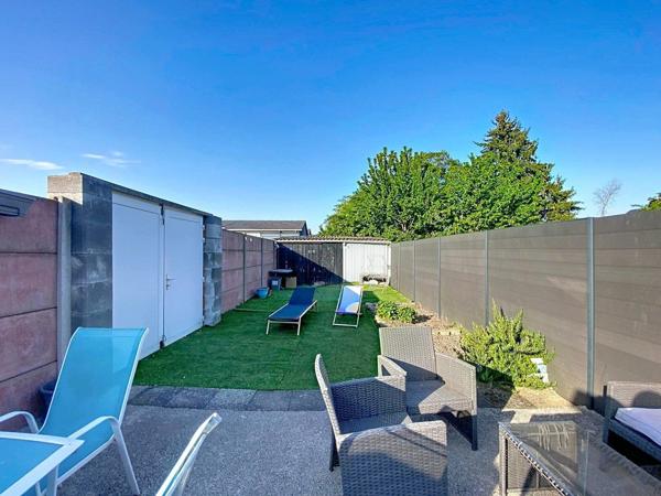 MAISON SEMI-INDIVIDUELLE AVEC JARDIN ET GARAGE