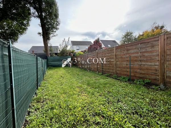 Maison de ville de 74 m², salon salle à manger, cuisine, salle de bains, terrasse, jardin, deux chambres. Hénin-Beaumont (62110)