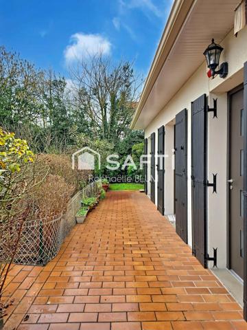 Plain pied à fort potentiel dans quartier prisé.