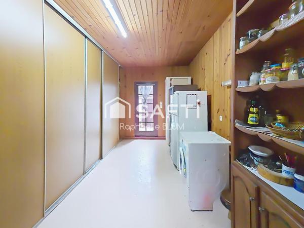 Plain pied à fort potentiel dans quartier prisé.